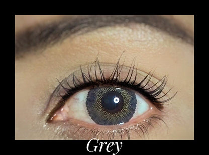 Gray Cosmetic YEARLY Coloured Contact Lenses — worn on eye