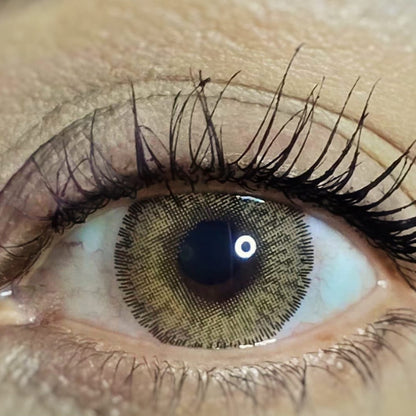 Hazel cosmetic coloured contact lens worn on the eye (zero power)
