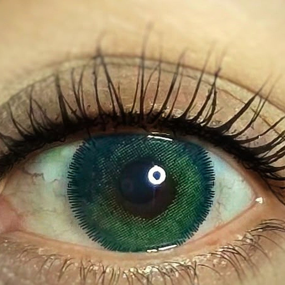 Marine cosmetic coloured contact lens worn on the eye (zero power)